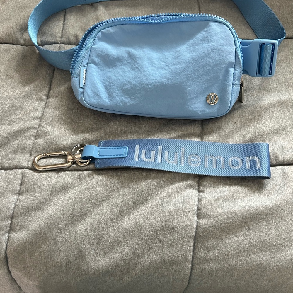 Lululemon Sky Blue Crossbody Bag and keychain